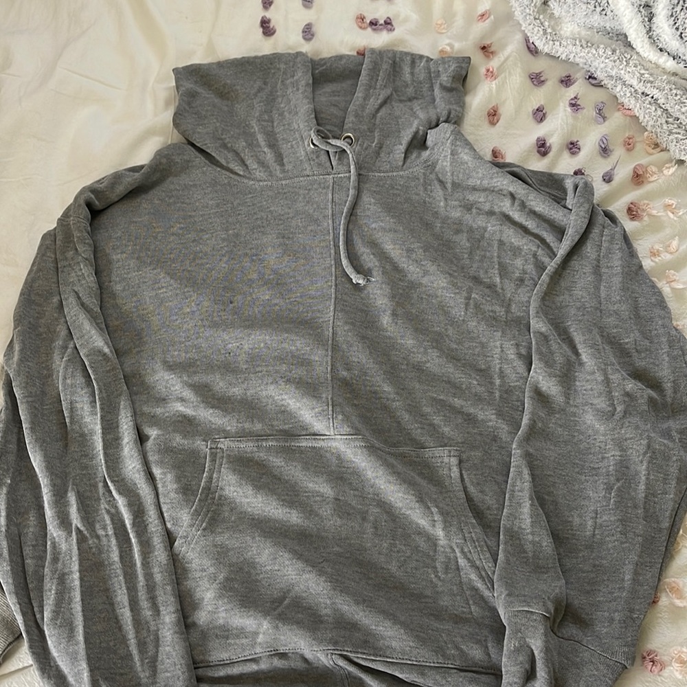 Brand new never been worn free people hoodie with a cutout in the back